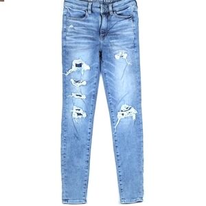 American Eagle Next Level Stretch Super Hi-Rise Jegging Light Wash Rippe…